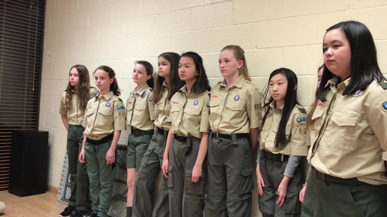 The Boy Scouts say they will now admit girls. Here's what that means.