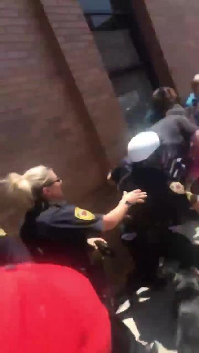 Police investigating confrontations between officers and protesters